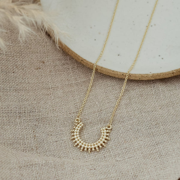 COLLIER GLEE "CURVED LUCK" GOLD